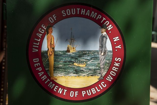 The seal of Southampton, which features a depiction of colonial settlers and the Shinnecock people, seen in town, Aug. 18, 2022.